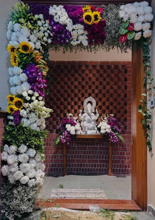 Pooja and entrance floral decoration by Ayodhya Events