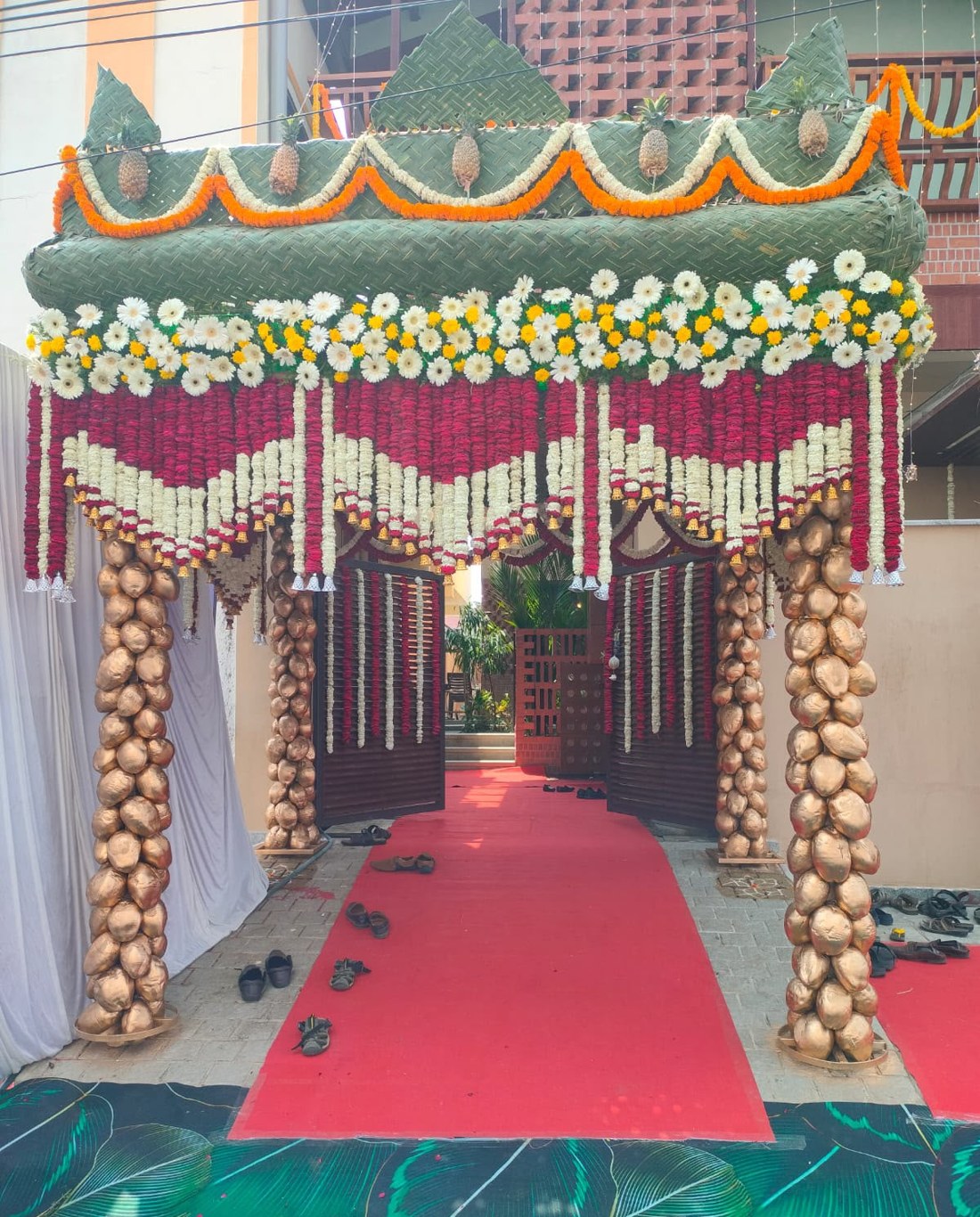 Pooja and entrance floral decoration by Ayodhya Events